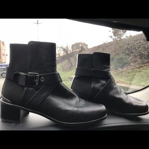 Stuart Weitzman black leather strap boots
